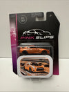 JADA Pink Slips Nissan GT-R in Orange 1:64 Diecast + Collector's Storage Tin Box